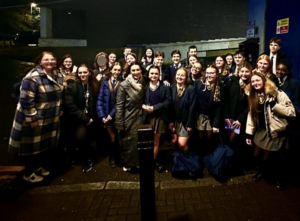 A large group of students smiling for a photo
